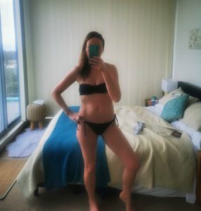 Lucy Baker in a black bikini in Forster NSW
